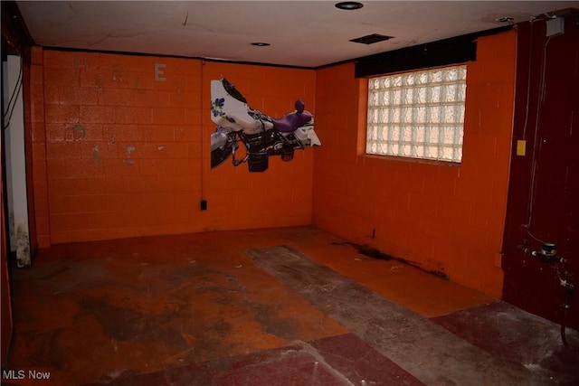 190 10th St, Campbell, OH 44405 - empty room featuring concrete block wall