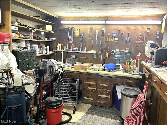 interior space featuring a workshop area