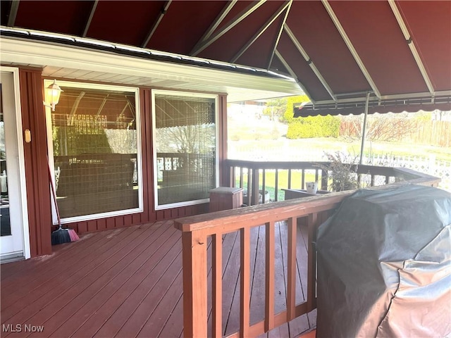 wooden deck with grilling area