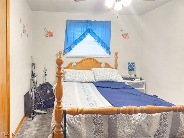 bedroom with baseboards, carpet floors, and ceiling fan
