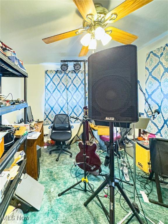 office area with a ceiling fan