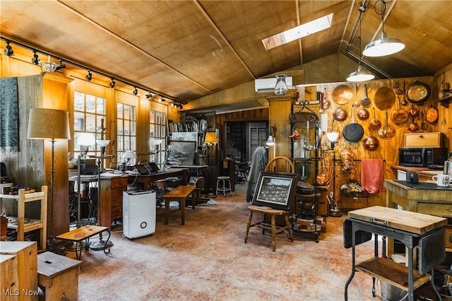 1000 Coon Fork Rd, Arnoldsburg, WV 25234 - miscellaneous room with wooden walls, vaulted ceiling, and a skylight