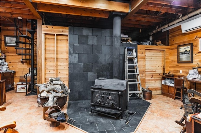 1000 Coon Fork Rd, Arnoldsburg, WV 25234 - basement with a wood stove, wood walls, and an AC wall unit