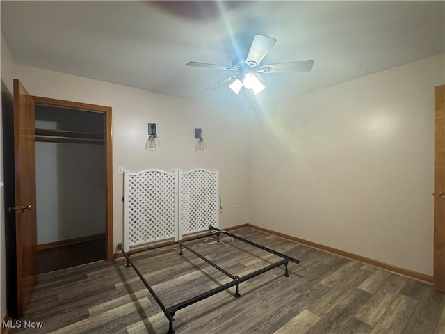 473 W 39th St, Shadyside, OH 43947 - empty room with ceiling fan, wood finished floors, and baseboards