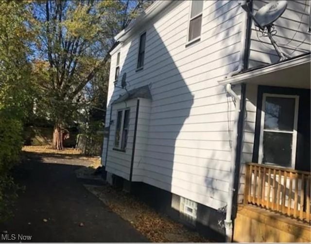 1444 E 135th St, East Cleveland, OH 44112 - view of home's exterior with aphalt driveway