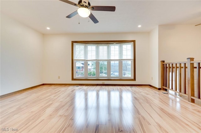 79 Windy Point Dr, Waterford, OH 45786 - unfurnished room with recessed lighting, baseboards, light wood finished floors, and ceiling fan
