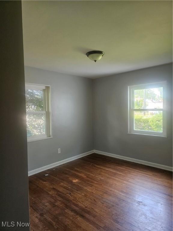 25100 Drakefield Ave, Euclid, OH 44132 - unfurnished room featuring dark wood-style flooring