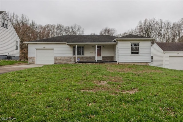 2955 Noel Dr, Youngstown, OH 44509 - single story home with stone siding, a garage, a front yard, driveway, and covered porch