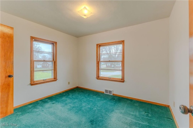 2955 Noel Dr, Youngstown, OH 44509 - empty room featuring baseboards, visible vents, and carpet