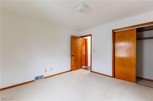 2955 Noel Dr, Youngstown, OH 44509 - unfurnished bedroom featuring baseboards, visible vents, a closet, and carpet floors