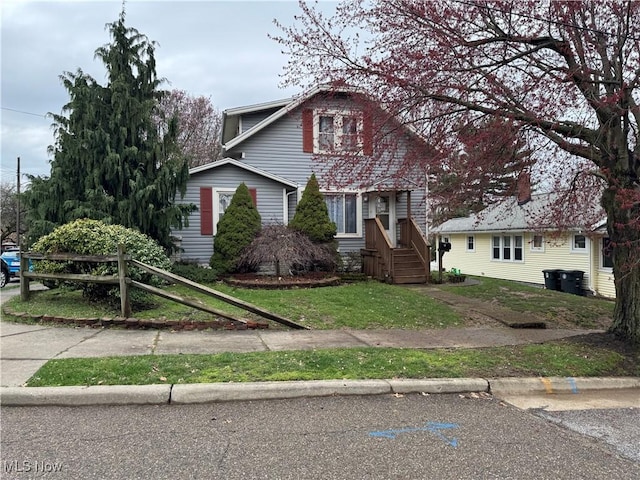 view of front of property with a front yard