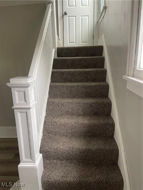 staircase with baseboards