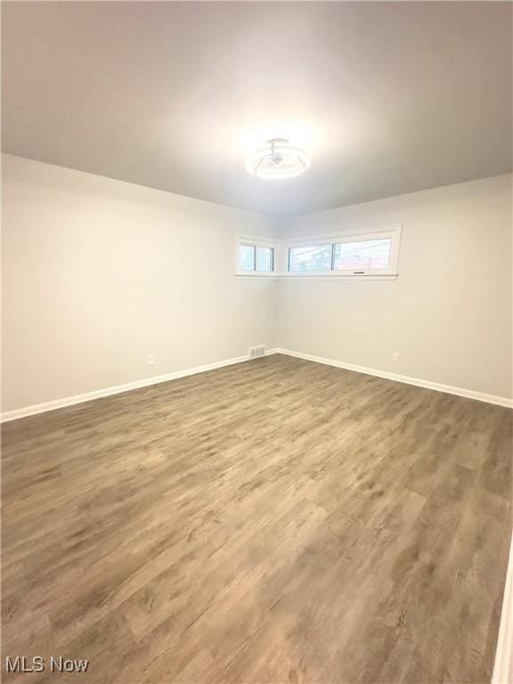 9171 Ridge Rd, North Royalton, OH 44133 - spare room featuring baseboards and wood finished floors
