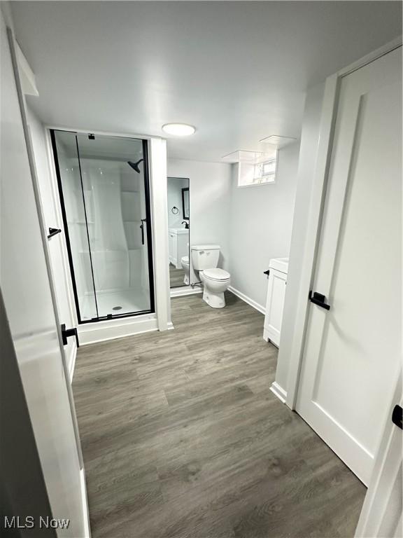 9171 Ridge Rd, North Royalton, OH 44133 - full bath featuring a stall shower and wood finished floors