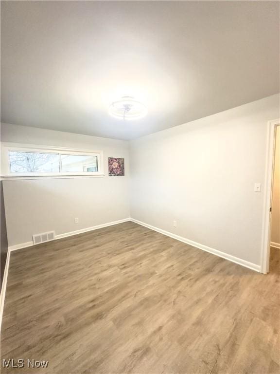 9171 Ridge Rd, North Royalton, OH 44133 - spare room featuring wood finished floors