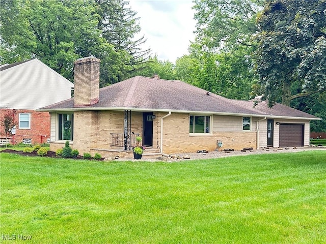 9171 Ridge Rd, North Royalton, OH 44133 - ranch-style house featuring a chimney, brick siding, a garage, and a front lawn