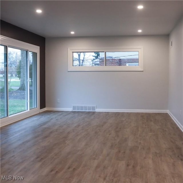 9171 Ridge Rd, North Royalton, OH 44133 - unfurnished room featuring plenty of natural light, recessed lighting, and dark wood-type flooring