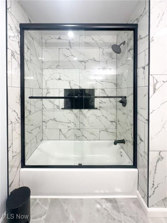 9171 Ridge Rd, North Royalton, OH 44133 - bathroom featuring washtub / shower combination and marble finish flooring