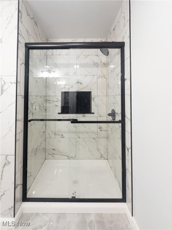 9171 Ridge Rd, North Royalton, OH 44133 - full bathroom featuring marble finish floors and a marble finish shower