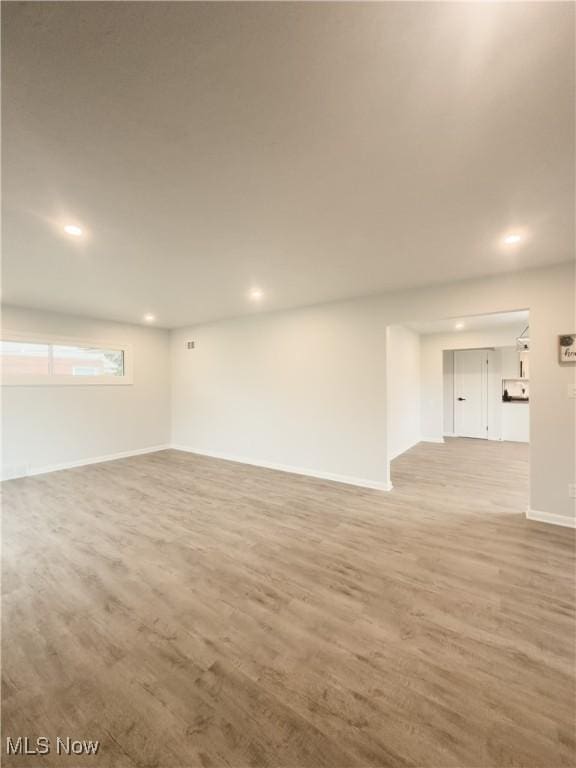 9171 Ridge Rd, North Royalton, OH 44133 - spare room featuring wood finished floors and recessed lighting