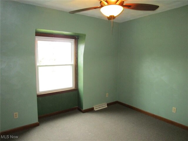 3701 Villa Marie Rd, Lowellville, OH 44436 - carpeted empty room with baseboards, ceiling fan, and visible vents