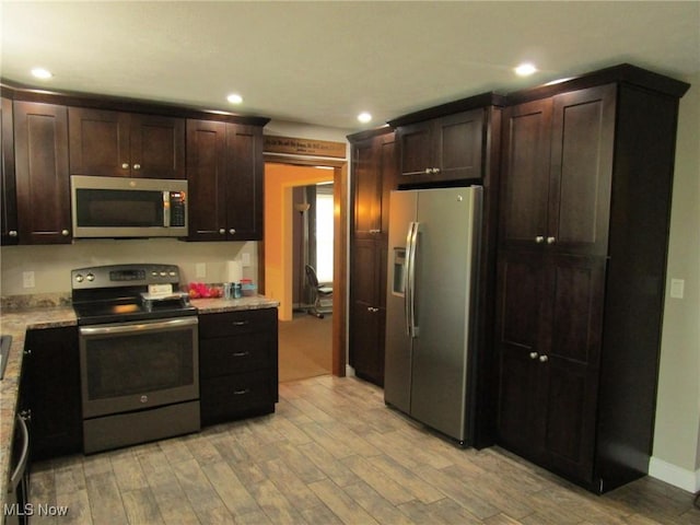 3701 Villa Marie Rd, Lowellville, OH 44436 - kitchen featuring light wood-style flooring, dark brown cabinetry, recessed lighting, and stainless steel appliances