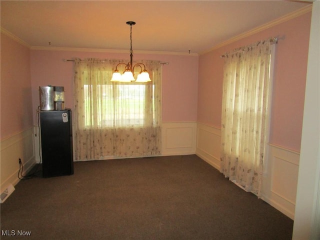 3701 Villa Marie Rd, Lowellville, OH 44436 - spare room featuring a wainscoted wall, a notable chandelier, crown molding, and dark carpet