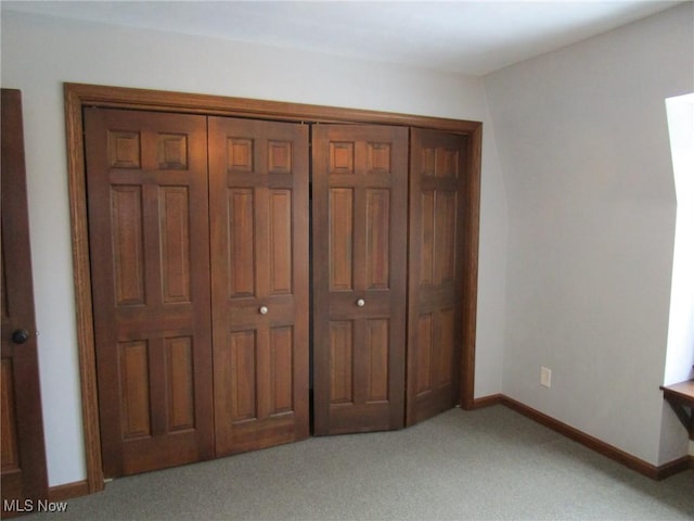 3701 Villa Marie Rd, Lowellville, OH 44436 - unfurnished bedroom featuring baseboards, carpet flooring, and a closet