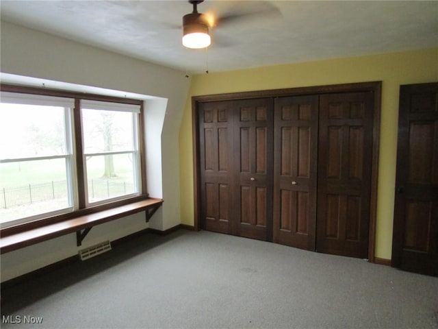 3701 Villa Marie Rd, Lowellville, OH 44436 - unfurnished bedroom featuring a closet, light carpet, baseboards, and visible vents