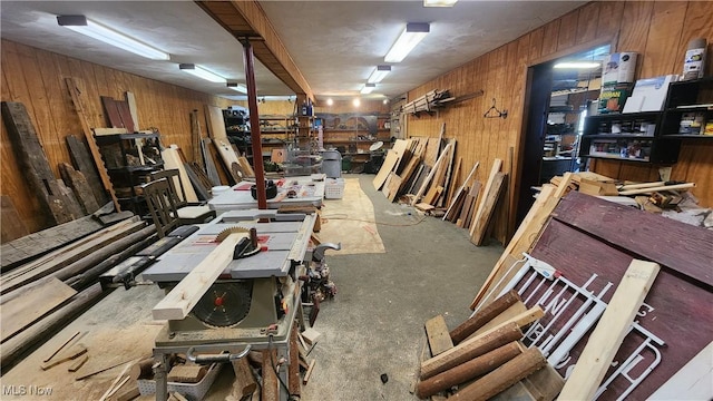 53525 Somerton Hwy, Jerusalem, OH 43747 - miscellaneous room featuring wooden walls, a workshop area, and concrete floors