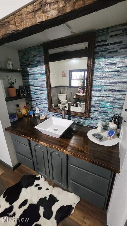 53525 Somerton Hwy, Jerusalem, OH 43747 - bar area featuring a sink and wood finished floors