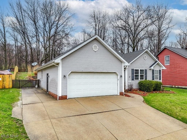 view of front facade featuring a front yard, concrete driveway, a garage, and fence