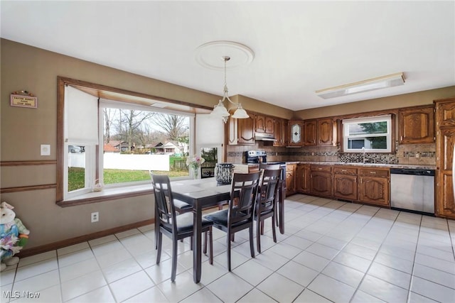 dining area with light tile patterned flooring