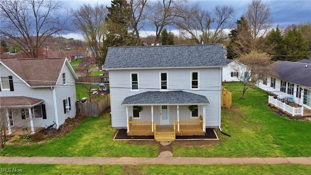 view of front of home with a porch and a shingled roof