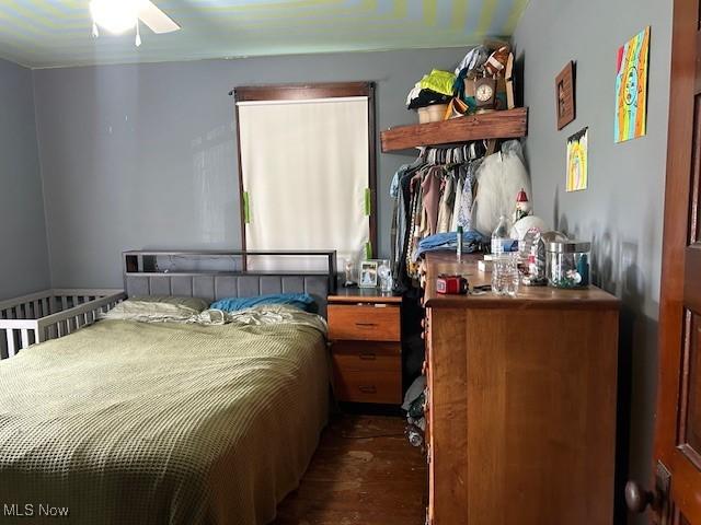bedroom featuring wood finished floors