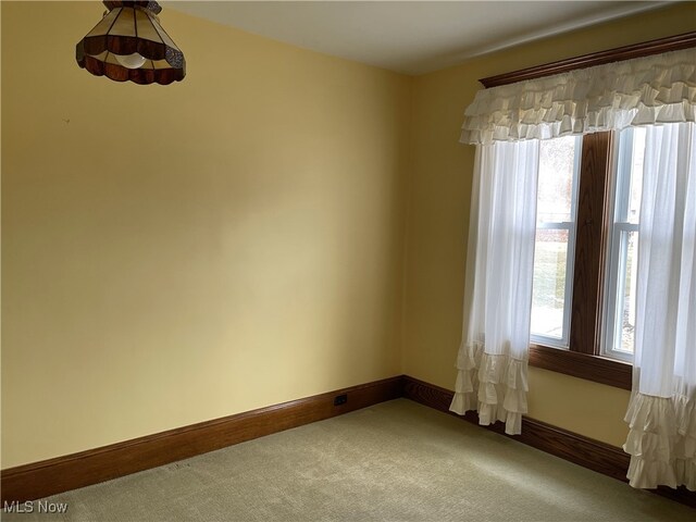 23314 Frostyville Rd, Caldwell, OH 43724 - carpeted empty room featuring baseboards and a wealth of natural light