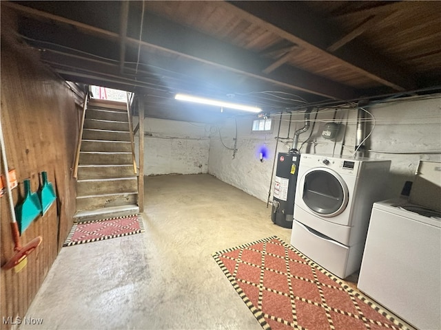 23314 Frostyville Rd, Caldwell, OH 43724 - below grade area with water heater, stairway, and washing machine and clothes dryer