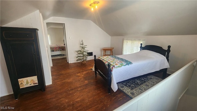228 N 8th St, Coshocton, OH 43812 - bedroom with wood finished floors and vaulted ceiling