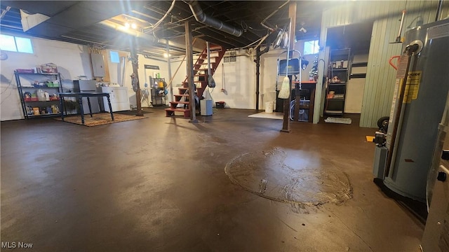 228 N 8th St, Coshocton, OH 43812 - basement with electric panel and washer / dryer