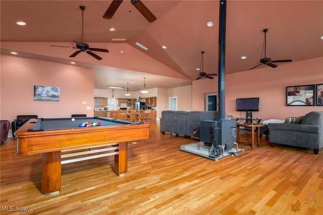 35955-35959 Bower Rd, Scio, OH 43988 - game room featuring pool table, light wood-type flooring, a wood stove, and a ceiling fan