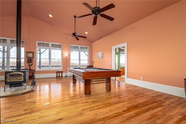 35955-35959 Bower Rd, Scio, OH 43988 - recreation room with high vaulted ceiling, a wood stove, billiards, light wood-style flooring, and ceiling fan