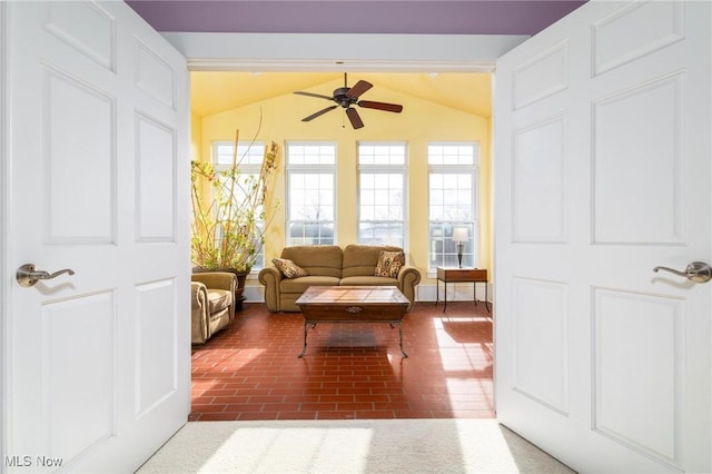 35955-35959 Bower Rd, Scio, OH 43988 - living area featuring lofted ceiling, brick floor, and a ceiling fan