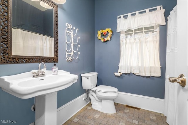 35955-35959 Bower Rd, Scio, OH 43988 - full bath with baseboards, visible vents, and toilet