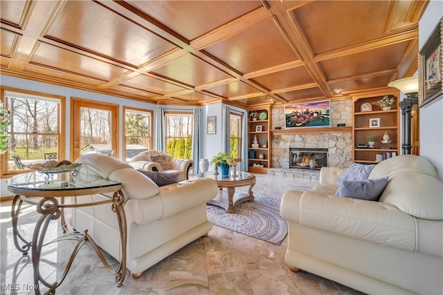 6722 Silvermound Dr, Mentor, OH 44060 - living area featuring healthy amount of natural light, a stone fireplace, light marble finish flooring, and coffered ceiling
