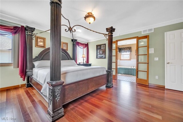 6722 Silvermound Dr, Mentor, OH 44060 - bedroom featuring wood finished floors, ornamental molding, and baseboards