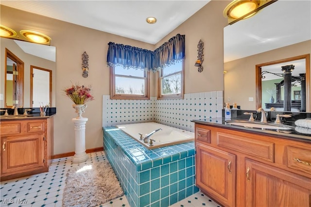 6722 Silvermound Dr, Mentor, OH 44060 - bathroom with two vanities and a garden tub