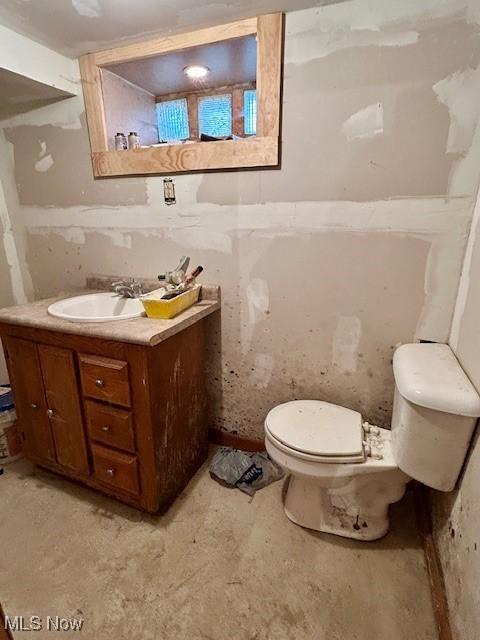 119 Erie St, Elyria, OH 44035 - bathroom with toilet and vanity