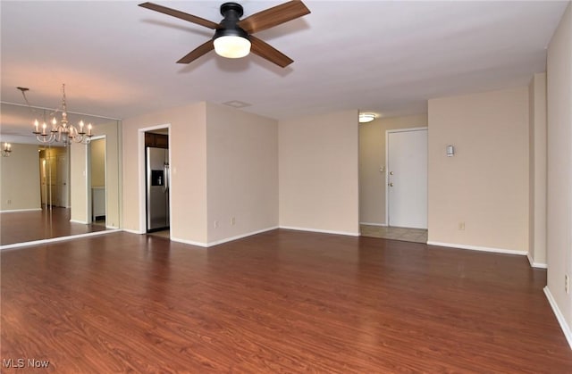 3333 Warrensville Center Rd Unit 204, Shaker Heights, OH 44122 - unfurnished living room featuring ceiling fan with notable chandelier, baseboards, and wood finished floors