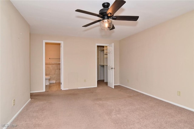3333 Warrensville Center Rd Unit 204, Shaker Heights, OH 44122 - unfurnished bedroom with ensuite bathroom, carpet floors, baseboards, and a spacious closet