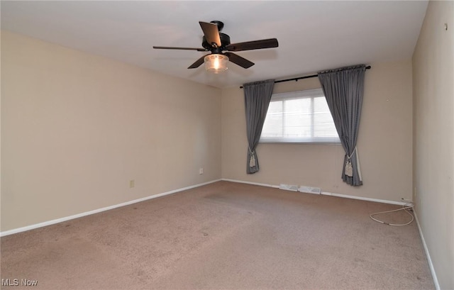 3333 Warrensville Center Rd Unit 204, Shaker Heights, OH 44122 - unfurnished room with baseboards, carpet flooring, ceiling fan, and visible vents